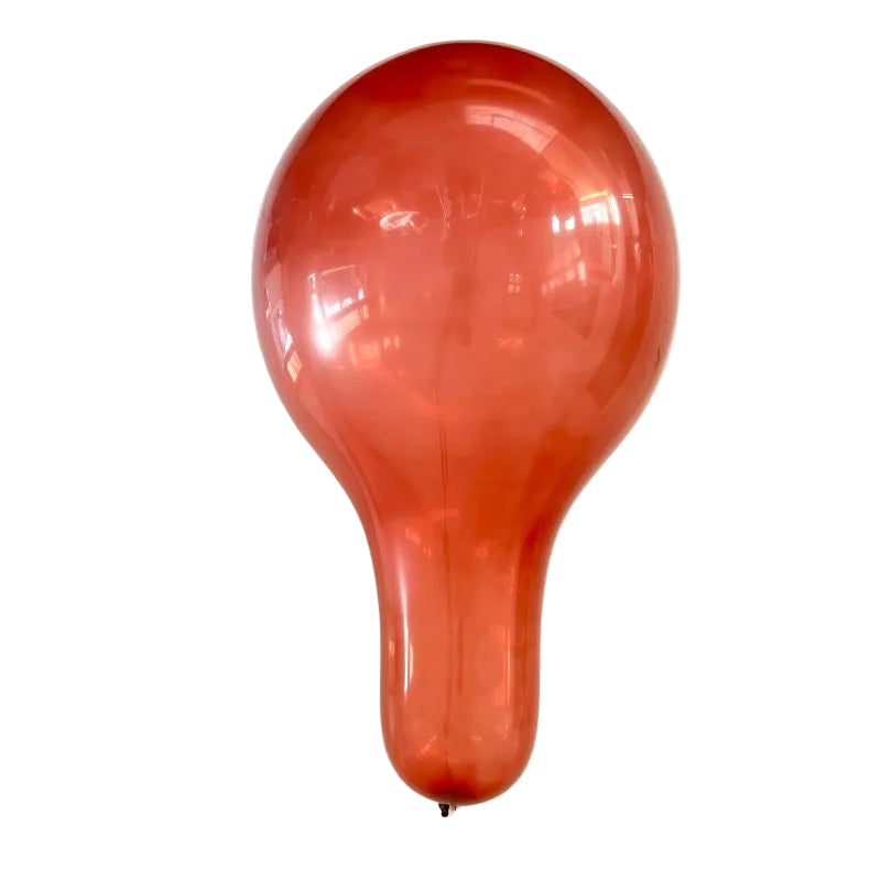 A helium filled burgundy balloon against a white background.